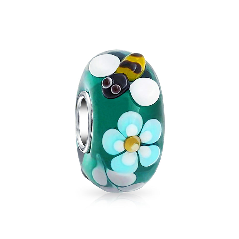 teal-bumble-bee-flower-bead_pbx-xsdc11146-az_1_e42ca6bb-c7bd-425e-94af-430250dce876 Teal Silver Bee Flower Murano Glass Charm Bead for European Bracelets - Image 1